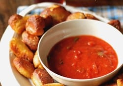 Homemade soft pretzel bites with Parmesan Cheese and Italian Seasoning. Served with marinara dipping sauce. www.lemonsforlulu.com