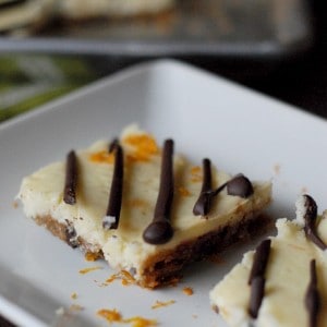 Gluten free chocolate chip orange cheesecake bars. www.lemonsforlulu.com