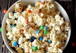 M & M mixed with popcorn, chocolate, and peanut butter! www.lemonsforlulu.com