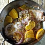 These pan seared pork chops are finished in the oven then covered in a simple orange glaze. www.lemonsforlulu.com