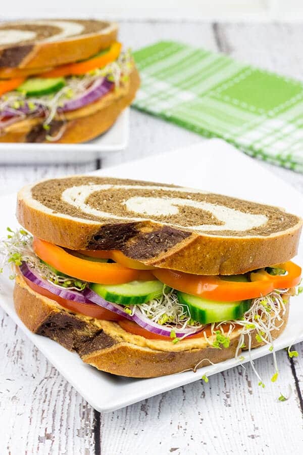 Sun Dried Tomato and Garlic Hummus Sandwiches via Spiced; Meal Plans Made Simple