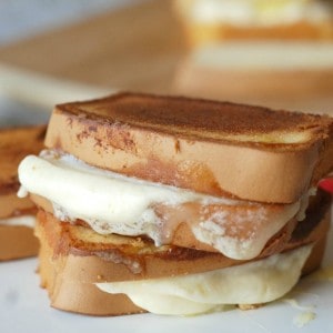 Tart lemon curd and creamy mascarpone cheese hidden between sweet pound cake for a dessert grilled cheese! www.lemonsforlulu.com