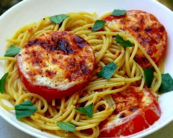 Basil Spaghetti with Cheesy Broiled Tomatoes via Noble Pig on Meal Plans Made Simple