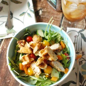 A simple chicken salad with sweet Belgian waffles, cherry tomatoes and arugula. A maple mustard dressing tops it off!