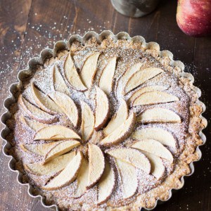 This easy apple tart takes not time to prepare but looks completely impressive! A fool proof crust and a creamy peanut butter filling will have you saying goodbye to traditional apple pie! www.lemonsforlulu.com