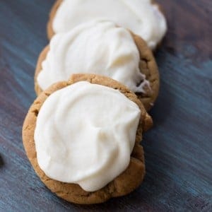 Mascarpone cheese and maple syrup come together for the luscious frosting that tops these molasses cookies! www.lemonsforlulu.com