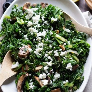 This wilted kale salad is packed with goodness, between the baby bella mushrooms, the toasted walnuts and the fresh citrus vinaigrette! Each bite is a powerful mouthful! www.lemonsforlulu.com #SplendaSweeties #SweetSwaps