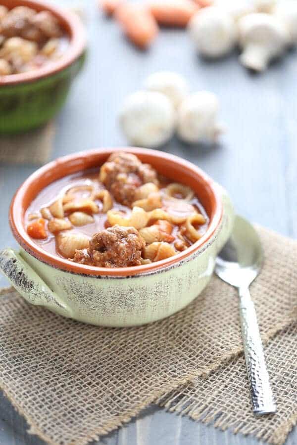 An easy vegetable soup with pasta and homemade meatballs that will have your family asking for seconds! lemonsforlulu.com