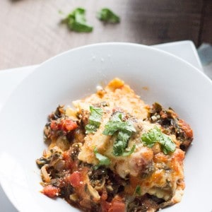 This easy ravioli lasagna will have dinner on the table quickly! Meat filled ravioli and a simple homemade spinach marinara sauce make this meal perfect for any night of the week. lemonsforluu.com