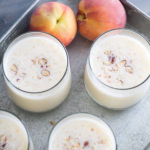 Peach Lassi recipe made with lots of fresh peaches and Greek yogurt. Easy and healthy never tasted so good!