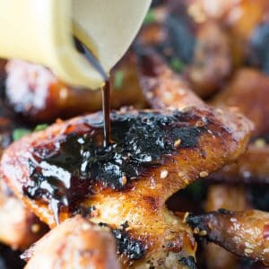A tangy sesame ginger sauce is brushed over chicken legs and wings then grilled up golden and crisp. Grilled chicken tastes so good!