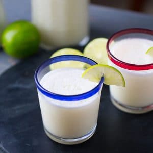 This lemonade slushie is like no other. This spin on the Brazilian beverage is creamy, icy, frothy and refreshing. It will become your favorite!