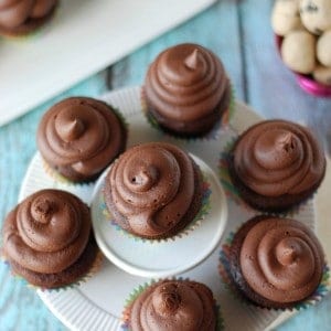 Rich chocolate cupcakes with thick mocha buttercream and sweet chocolate chip cookie dough hidden inside! www.lemonsforlulu.com
