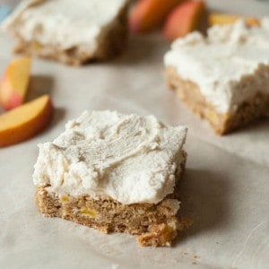 Peach cake with lots of fresh peaches and cinnamon and frosted with a an easy brown sugar frosting! www.lemonsforlulu.com #walmartproduce