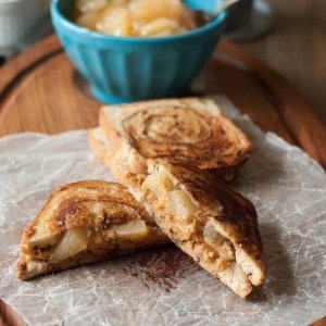 4 slices cinnamon bread 2 teaspoons butter 1 cup apple pie filling ¼ cup whipped peanut butter 2 tablespoons whipped cream cheese