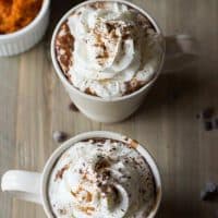 This simple hot chocolate recipe incorporates pumpkin puree, pumpkin spice and chocolate for a rich and cozy treat! www.lemonsforlulu.com #IDelight