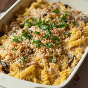 This tuna noodle casserole is comfort food at it’s best! Three types of cheese makes this casserole rich and smooth and absolutely delicious! Great for those busy nights! www.lemonsforlulu.com