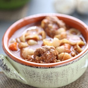 An easy vegetable soup with pasta and homemade meatballs that will have your family asking for seconds! lemonsforlulu.com