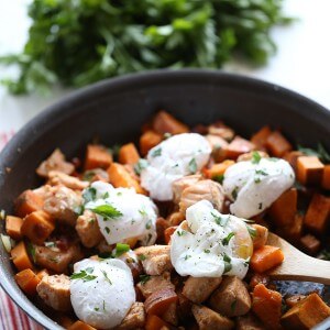 Sweet potato hash with salmon and eggs is the perfect meal for breakfast OR dinner! lemonsforlulu.com