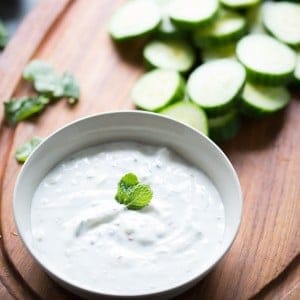 This easy yogurt dip is made with Greek yogurt, fresh mint and garlic. A touch of sweetness makes rounds out all the flavors! lemonsforlulu.com #SweetSwaps