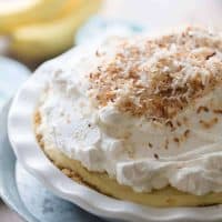 Coconut banana cream pie has a thick custard base, packed with the tropical taste of coconut and roasted bananas! lemonsforlulu.com