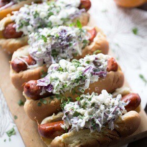 Flavorful andouille sausage is covered in a creamy, cool blue cheese coleslaw! lemonsforlulu.com
