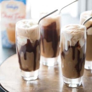 A new and imporved root beer float recipe! This fun frozen treat features root beer along with vanilla chai tea latte for a unique and delicous frosty drink! lemonsforlulu.com #IDelightinChai
