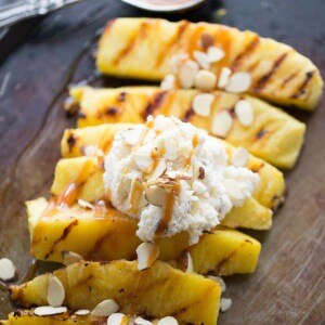 Easy Grilled Pineapple is sweet and delicious! Serve it with a simple mascarpone whipped cream! lemonsforlulu.com
