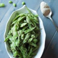 Edamame coated in olive oil, lots of garlic and Parmesan cheese! lemonsforlulu.com