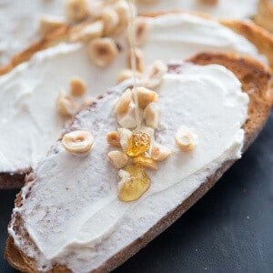 This simple elegant goat cheese appetizer is rich, tangy, sweet and delicious! The crunchy hazelnuts takes it to a whole new level! lemonsforlulu.com
