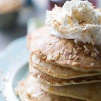 A simple toasted coconut pancake recipe with toasted coconut, coconut extract and almondmilk coconutmilk! lemonsforlulu.com