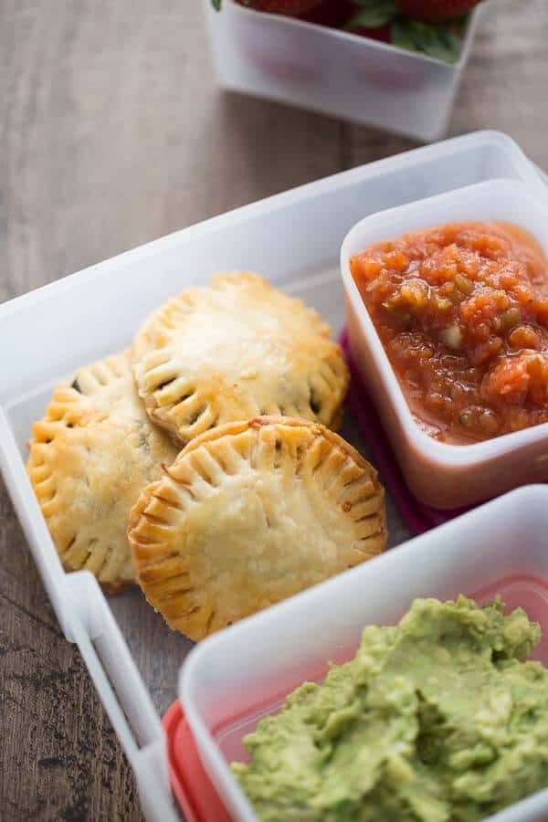 Mini savory hand pies filled a with a taco meat, beans and cheese! lemonsforlulu.com #OhioBeef