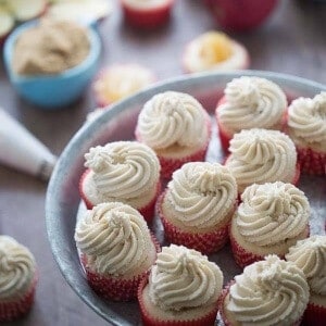 Eleven Apple Pie Cupcakes on an iron plate.