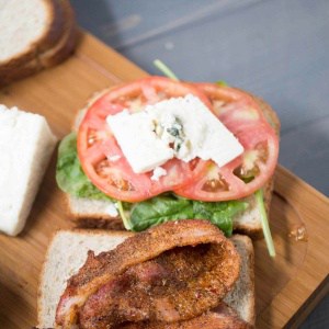 This gourmet BLT recipe features bbq seasoned bacon and thickly sliced blue cheese! lemonsforlulu.com