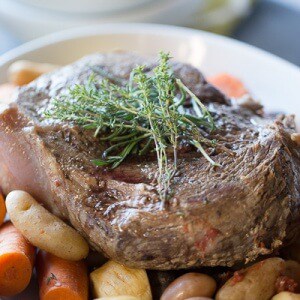 This slow cooker pot roast is going to knock your socks off! Tender beef and simple vegetables are cooked low and slow and are ready when you are! lemonsforlulu.com