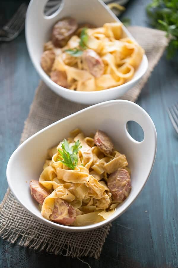 A simple pumpkin pasta sauce recipe that is spiced with chipotle peppers. The sauce and pasta are lightly tossed with smoked sausage! Each bite is rich and flavorful! lemonsforlulu.com