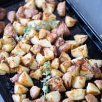 Oven-roasted-potatoes-that-are-simply-tossed-with-garlic-hummus. lemonsforlulu.com