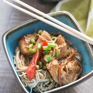 Blue bowl of Chicken Teriyaki with Noodles with wooden chopsticks.
