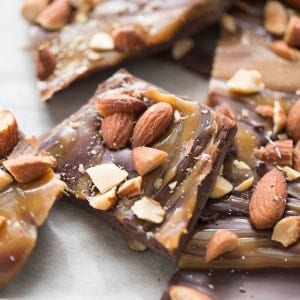 Dark chocolate bark recipe with sweet swirls of caramel and lightly salted almonds! lemonsforlulu.com