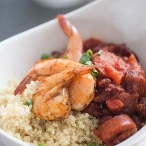 Cajun shrimp recipe over a simple mix of beans, sausage and quinoa! lemonsforlulu.com