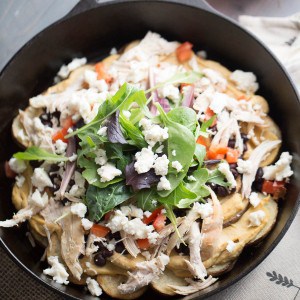 Nachos with a light twist! Hummus, black beans, chicken and veggies make these Irish nachos an irreistibly good game day snack! lemonsforlulu.com