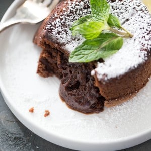Limoncello chocolate lava cake is a rich and fudgy dessert, perfectly baked into individual portion sizes! You'll love these Limoncello infused chocolate lava cakes!
