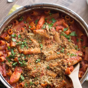 This easy chicken Parmesan recipe is truly a one hit wonder! Lean chicken, homemade marinara, cheese and a breaded topping make this pasta recipe delicious!
