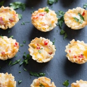 Homemade pimento cheese tucked inside little fillo cups! Perfect little finger foods!