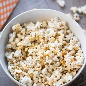 Homemade kettle corn recipe served with a sprinkling of bbq seasoning!