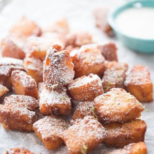 Fried tequila shots are sipped bites of angel good cake that have been dipped in tequila! I served these with a very simple lime dipping sauce; a little margarita taste with every bite!