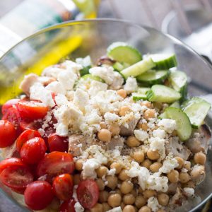Chicken Souvlaki is a Greek staple! This easy grilled chicken is added to pasta, crisp and fresh vegetables and then topped with a homemade dressing.