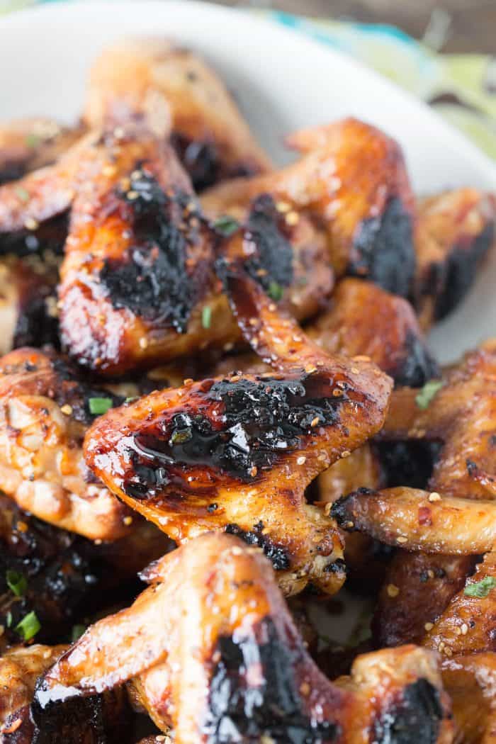 A tangy sesame ginger sauce is brushed over chicken legs and wings  then grilled up golden and crisp.  Grilled chicken tastes so good!