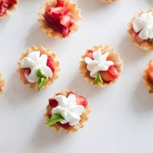 Strawberries Romanoff is such a great way to use fresh strawberries. Fillo cups make the best cups for this simple, fruity recipe.