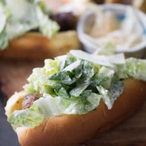 Caesar Salad is cool, crisp and creamy. This easy salad is the perfect counterpart to hot, grilled sausage!